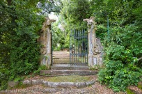 A "Secret Gate" guarded by two dragons, Villa Garzoni gardens, Italy.